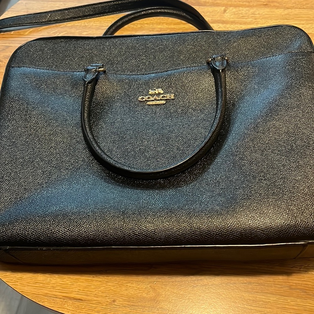Black Coach Laptop Bag.  Excellent condition. Fits 17 inch laptop. Adjust strap